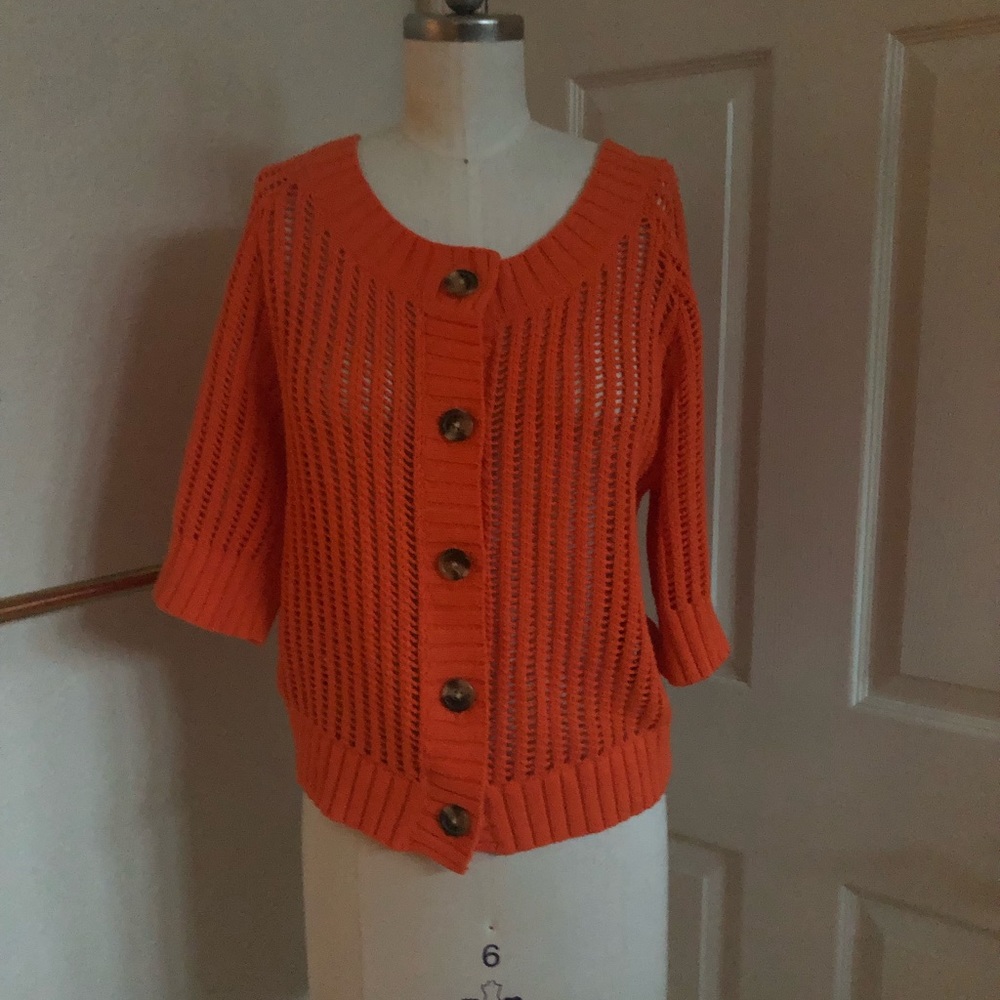 Cropped orange crochet sweater
